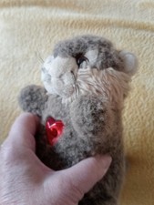 Listing image for Skiing Memorabilia Soft beever like Toy + red heart -Wolf Whistles when pressed